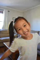 A parent reviewing school photo packages